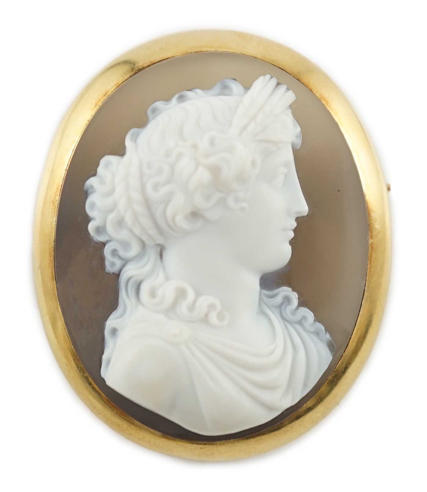 A late 19th/early 20th century gold mounted chalcedony cameo set oval brooch